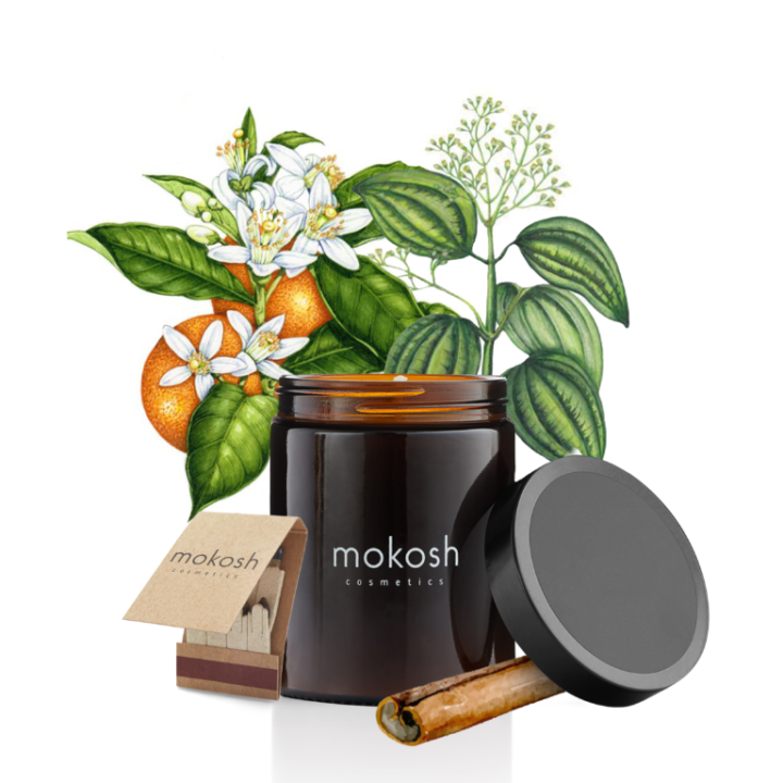 Свеќа со мирис на портокал и цимет